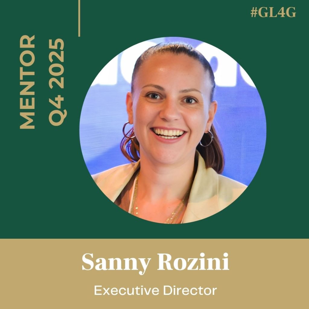 Portrait of Sanny Rozini, Executive Director, with a smiling expression against a blue background, labeled as Mentor for Q4 2025.